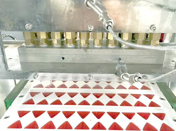 How is production efficiency of gummy making machine.png